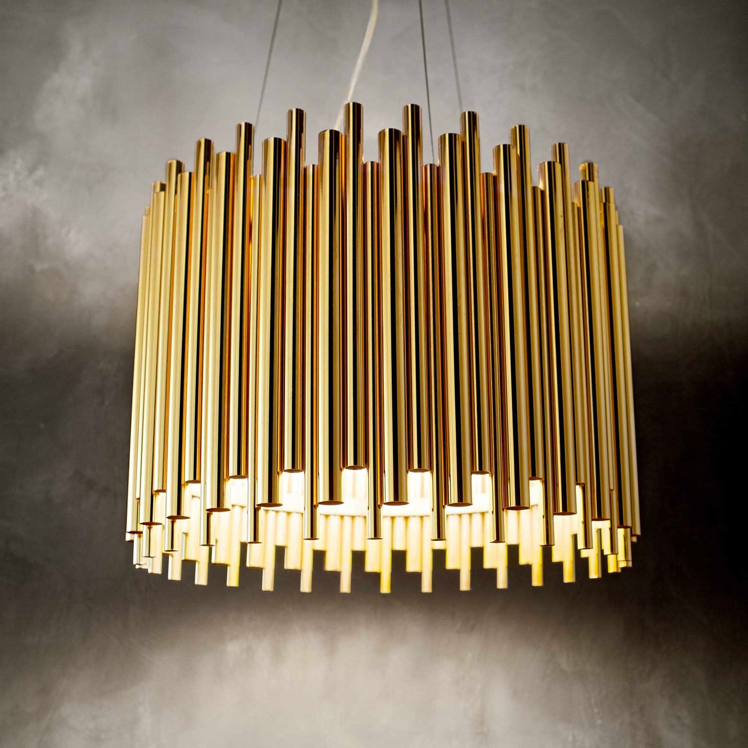 PAN – Runde goldene Röhren-Pendelleuchte im Art-Deco-Stil